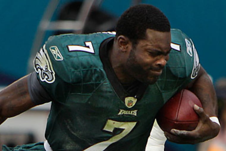 Quarterback Michael Vick said protective padding helped him get through Sunday's game. (David Maialetti/Staff Photographer)