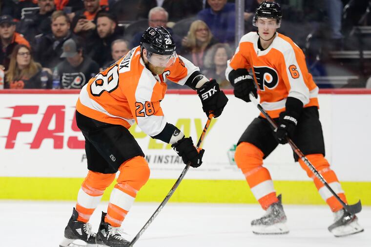 Claude Giroux (left) and Travis Sanheim (right) are two of the Flyers' three players on the COVID-19 protocol list.