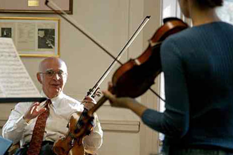 Curtis Institute of Music professor Joseph Silverstein coaches a violinist. Many at his school take beta-blockers for performance anxiety, but he is against it. (PETE CHECCHIA)