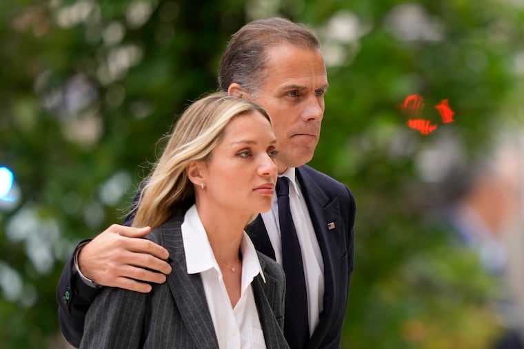 Hunter Biden, accompanied by his wife, Melissa Cohen Biden, arrives to federal court in Wilmington on Tuesday.