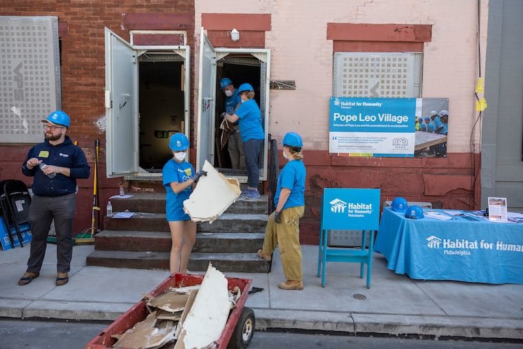 Villanova University students volunteered with Habitat for Humanity Philadelphia to help rebuild homes as part of the Pope Leo Village in Philadelphia, Pa., on Saturday., April. 18, 2026.