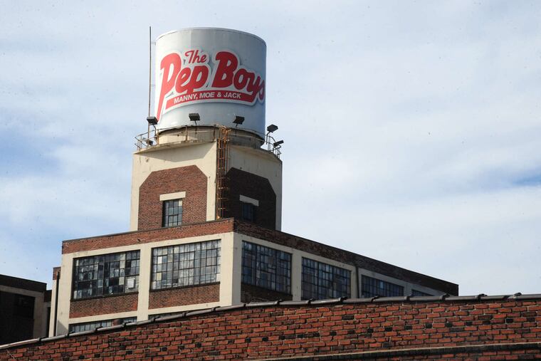 Pep Boys' Allegheny Avenue headquarters (above) will stay open . . . for now. The auto chain, which began in West Philly in 1921, is known for its mascots, Manny, Mo and Jack (left), named for its co-founders.