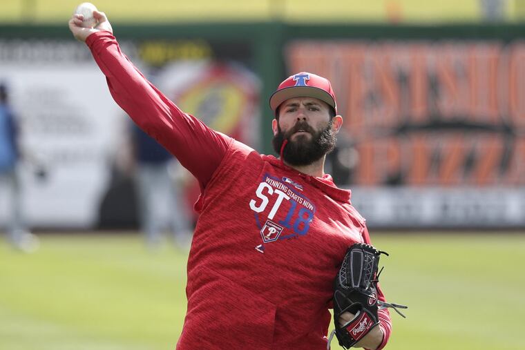 Phillies pitcher Jake Arrieta throws during a work out before a spring training game.