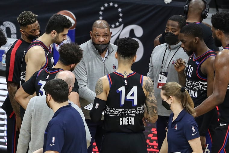 Sixers' head coach Doc Rivers talks to his team during a timeout with the Warriors during the 4th quarter on Monday, April 19, 2021. There haven't been too many games of late where Rivers has been able to talk to his whole team.