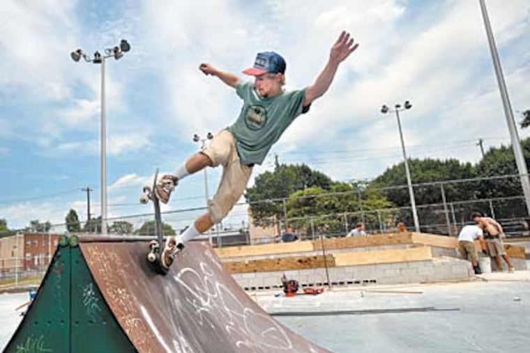 Jesse Clayton, a skateboard park designer, takes a break at Whitehall Skatepark at Carmella Playground, site of a $10,000 rehab project by the local Franklin’s Paine Skatepark Fund. (SHARON GEKOSKI-KIMMEL / Staff Photographer)