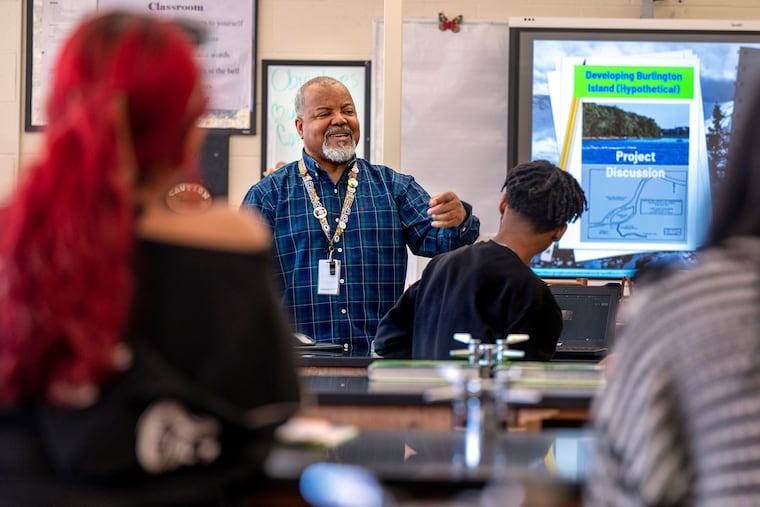 Al Jackson teaches science at Burlington City High School Monday, Mar. 11, 2024. He began preparing for a second career in teaching while serving active duty in the U.S. Air Force. Other retirees from the military and corporate America are joining the teaching ranks.