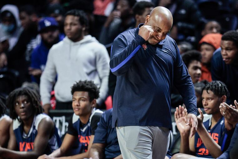 West Philly coach Adrian Burke celebrates near the end of their 58-52 victory over Constitution in a Public League semifinal on Tuesday at the Liacouras Center.