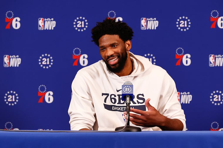 Sixers center Joel Embiid smiles while addressing the media after winning the regular season NBA MVP award before Game 2 of the Eastern Conference semifinal.