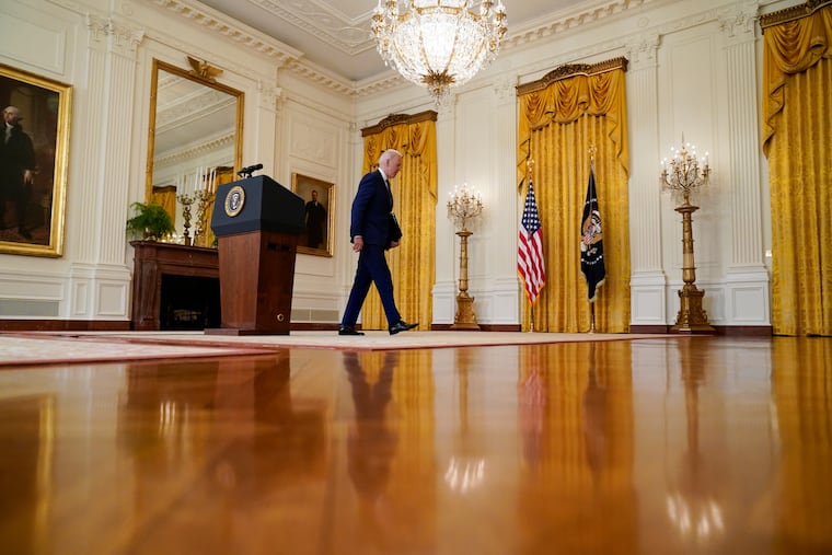 President Joe Biden leaves after speaking about Russia in the East Room of the White House.