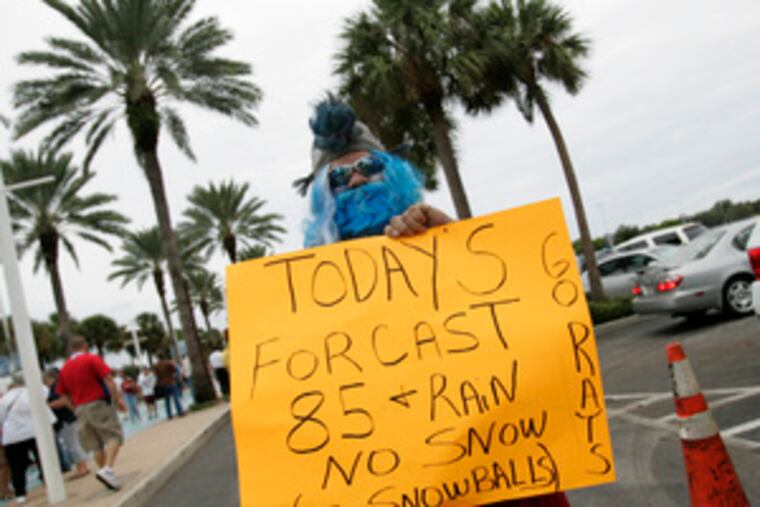 Playing off a Philadelphia stereotype, a Floridian Santa Claus, also known as George Crottie of Clearwater, advised Phillies fans the conditions weren't right for snowballs before Game 2.