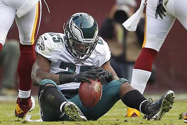 LeSean McCoy sits dejected on the turf after being thrown for a loss on a pass play in the first half against the Redskins back on Nov. 18, 2012. (Ron Cortes/Staff Photographer)
