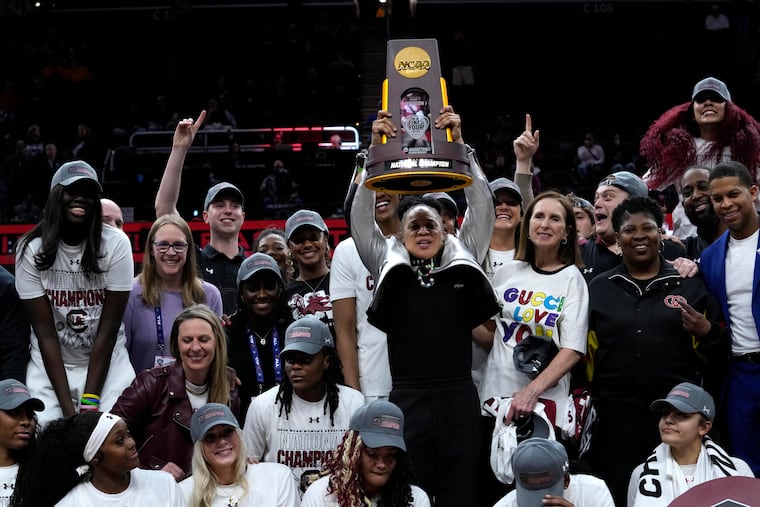 South Carolina coach Dawn Staley celebrates with her team after the victory against Iowa in the NCAA final on April 7.