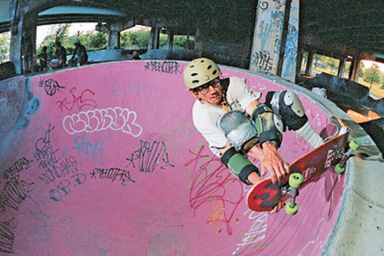Bud Baum rides his board in a Phil Jackson photo from "FDR Skatepark." The book features more than 100 photos compiled by the authors.