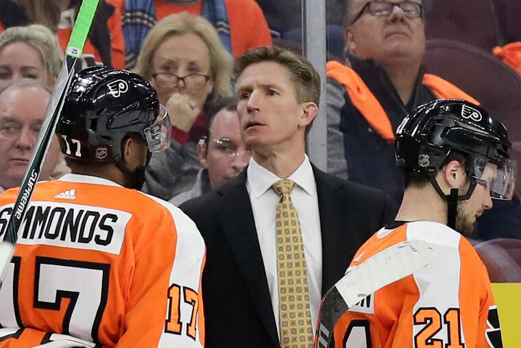 Dave Hakstol, shown behind the Flyers bench in 2018, will coach the expansion Kraken.
