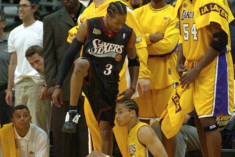 In the most memorable moment of a memorable Sixers season, Allen Iverson steps over Lakers guard Tyronn Lue in Game 1 of the 2001 NBA Finals.