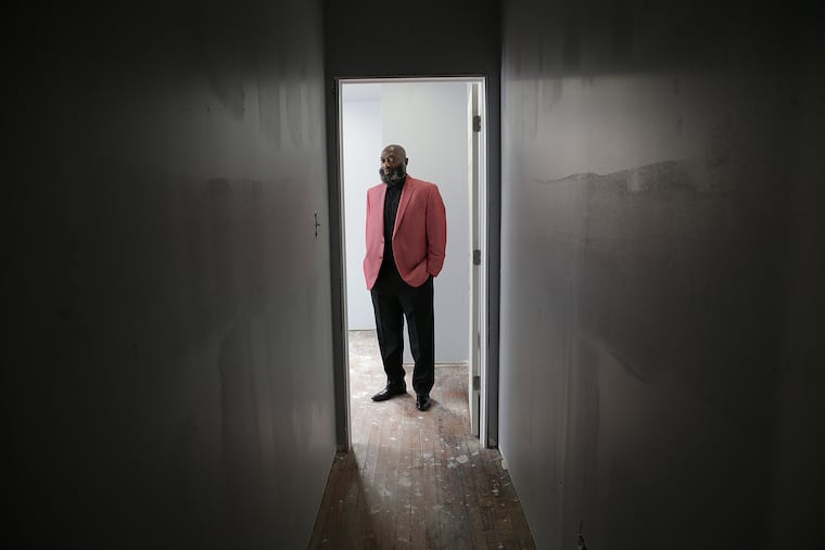 Thomas Daniels, who received a commuted sentence from President Obama two years ago, was working as an Uber driver. Last month, Uber told him that convictions that are now more than 20 years old were prompting them to kick him off the app. Lawyers say this could be against a Philadelphia ordinance designed to protect released offenders from employment discrimination. He is pictured in Philadelphia, PA on May 10, 2018. DAVID MAIALETTI / Staff Photographer