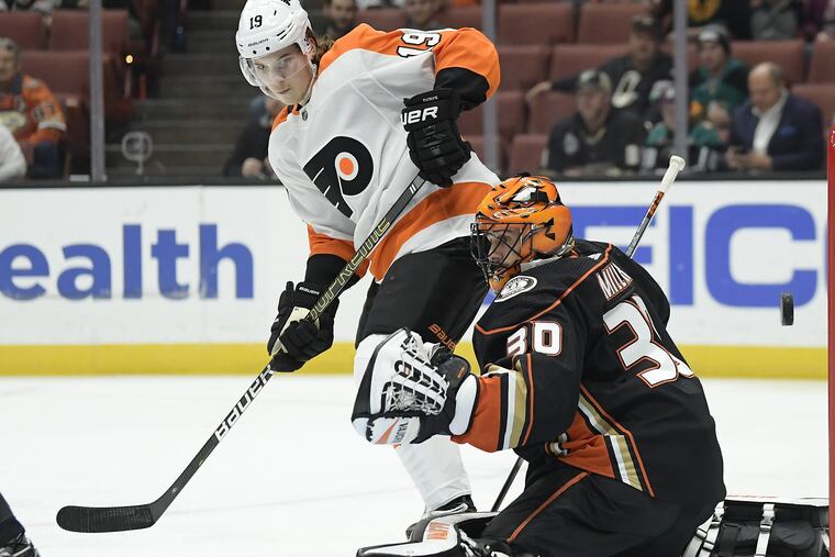 Nolan Patrick watches Sean Couturier's shot beat Ducks' goalie Ryan Miller on Tuesday.