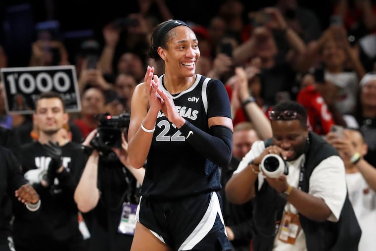 Las Vegas Aces center A'ja Wilson (22) celebrates during the second half of a WNBA basketball game against the Connecticut Sun, Sunday, Sept. 15, 2024, in Las Vegas.