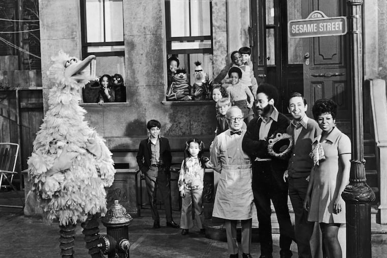 Cast members of 'Sesame Street' on the set with some of Muppets circa 1969 (from left): Will Lee, Matt Robinson, Bob McGrath, and Loretta Long with Big Bird, Cookie Monster, Grover, Ernie, Bert, and Oscar the Grouch.