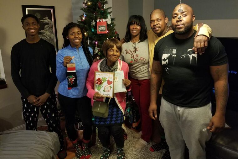 Mrs. Terrell (center), surrounded by her family, had a lust for life and sense of adventure. "She didn’t have a fear of traveling wherever she decided she wanted to go,” said her daughter.