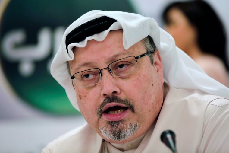 FILE - In this Dec. 15, 2014, file photo, Saudi journalist Jamal Khashoggi speaks during a press conference in Manama, Bahrain. Saudi state media said Thursday, Jan. 3, 2019, that suspects in the slaying of journalist Jamal Khashoggi have attended their first court hearing. The state-run Saudi Press Agency said that prosecutors plan to seek the death penalty for five of the 11 who were at the hearing. The brief statement did not name the suspects. (AP Photo/Hasan Jamali, File)