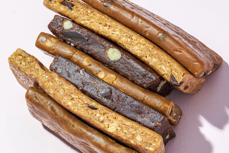 Protein bars are not the first choice among dietitians for satisfying nutritional needs, but they can be healthy enough if chosen well. MUST CREDIT: Rey Lopez/For The Washington Post