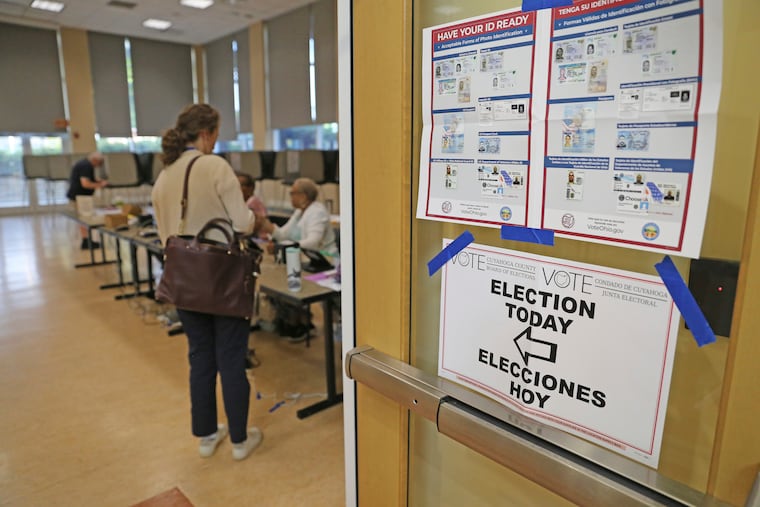Voters come and go at the Beachwood Community Center in Beachwood, Ohio, on Tuesday morning to vote on Issue 1, an abortion rights amendment, during the special election to decide the issue.