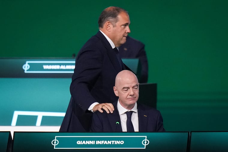 Concacaf President Victor Montagliani (top), who is also a FIFA vice president, with FIFA president Gianni Infantino at the FIFA Congress in Montaglaini's hometown of Vancouver, British Columbia in April.