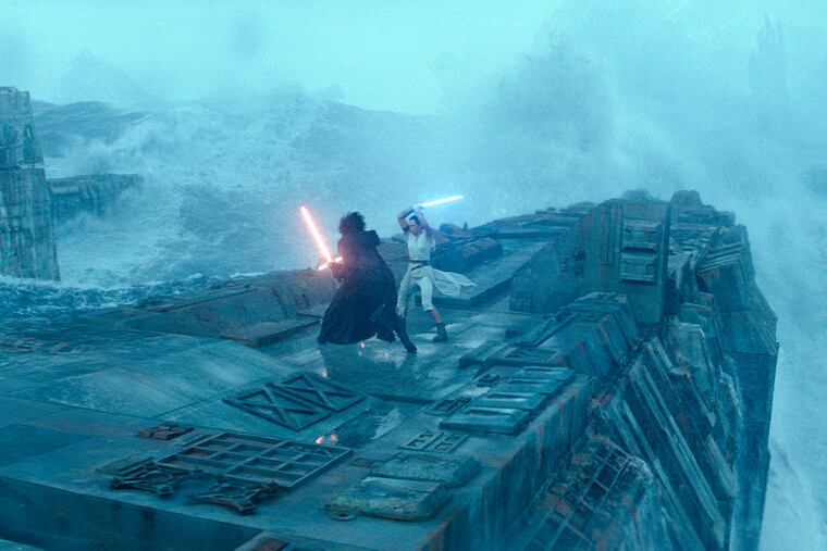 This image released by Lucasfilm shows Adam Driver as Kylo Ren, left, and Daisy Ridley as Rey in a scene from "Star Wars: The Rise of Skywalker."