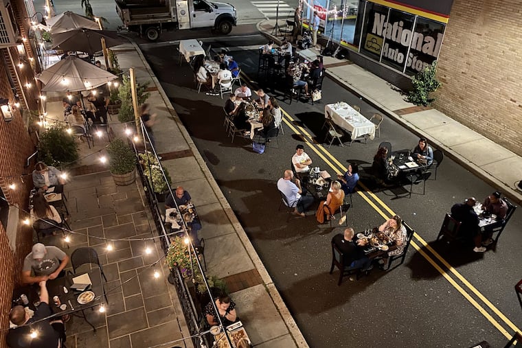 Diners fill seating on the patio and in Wood Street outside of Stove & Tap restaurant in Lansdale on Sept. 12, 2020.