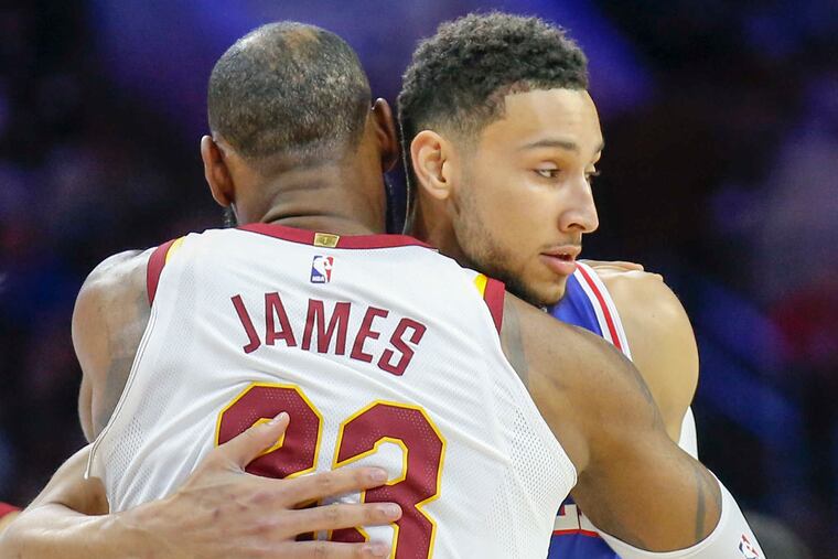 Sixers guard Ben Simmons meets Cavaliers forward LeBron James. YONG KIM/Staff Photographer
