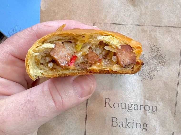 A hand pie stuffed with jambalaya from Rougarou Baking, a new Cajun and Jewish bakery in Queen Village.