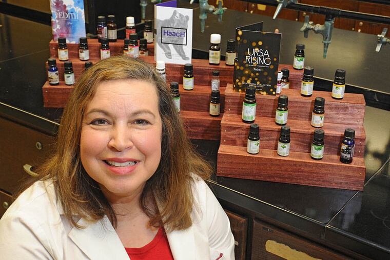 That 100-year smell: Harcum College chemistry professor Alexandra Hilosky, who studied perfume-making in France, developed three scents to promote the school’s centennial — or, as she suggested calling it, the “Scentennial.” (CLEM MURRAY / Staff Photographer)
