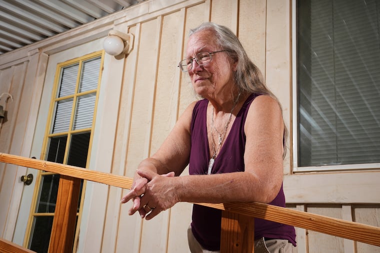 Linda Hilton, a 76-year-old retired office worker, stands in front of her home Tuesday, May 13, 2025, in Apache Junction, Ariz. “It’s going to mean restrictions,” says Hilton, of having her Social Security checks garnished.