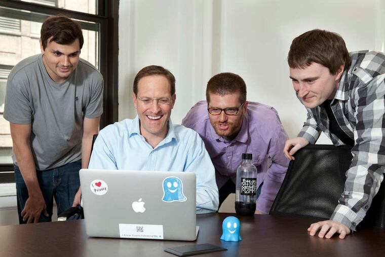 Evidon Inc. CEO Scott Meyer (second from left) with employees (from left) Alex Catighera, Christopher Roberts, and Jesse Rohland. Of Evidon's Ghostery program, Meyer says: "We're trying to reveal the invisible Web."