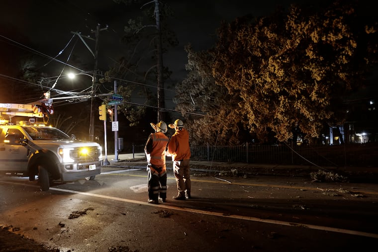 Peco crews work to restore damaged power lines at Chestnut Hill Avenue near Germantown Avenue in Philadelphia in 2025.