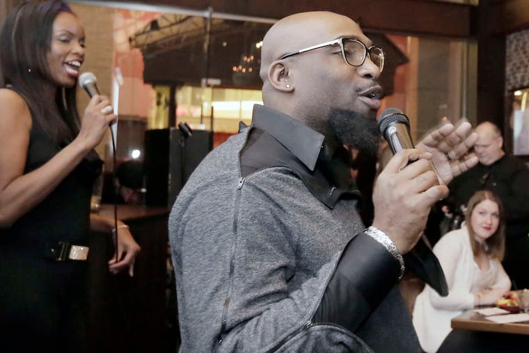 Jenice Armstrong with celebrity stylist Anthony Henderson-Strong at a Philly Oscar party in 2015.