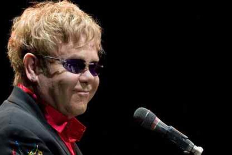 Elton John (left) and Rush Limbaugh (above) made quite the odd couple Saturday, when the openly gay singer performed at the wedding of the conservative talkster and his fourth wife in Palm Beach, Fla.