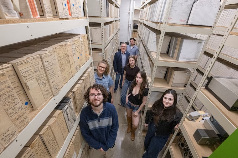 Drexel University students with Monika Julien (second from left), a professor in the Drexel University Music Business program, and Toby Seay (third from left), Drexel professor and music industry director of audio archives, pose for a group photo in the Audio Archives vault at Drexel University in Philadelphia.