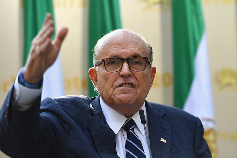 Rudy Giuliani, former mayor of New York City, speaks to the Organization of Iranian American Communities during their march to urge "recognition of the Iranian people's right for regime change," outside the United Nations Headquarters in New York on Sept. 24, 2019. (Angela Weiss/AFP/Getty Images/TNS)