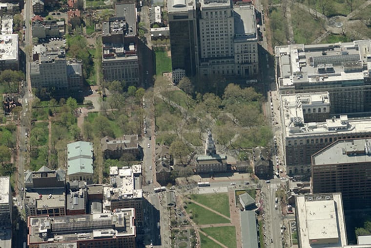 Aerial photo of the Independence Mall area, looking south. Developer Tom Scannapieco's planed 26-story condo tower at the southwest corner of Fifth and Walnut Streets is just one of many projects underway. (Pictometry International photo)