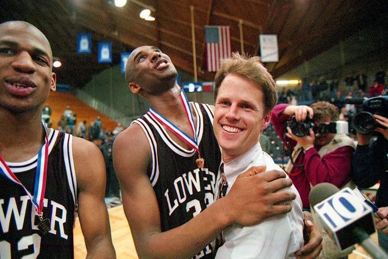 Kobe Bryant and Lower Merion head coach Gregg Downer celebrate the Aces' 1996 PIAA Class AAAA boys basketball championship.