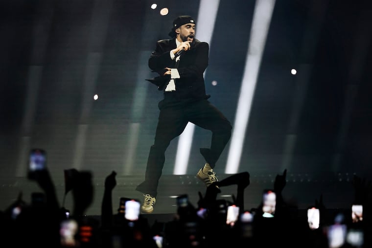 Bad Bunny performs at the Wells Fargo Center in April 2024. The Puerto Rican rapper and singer is nominated for six Grammys, including album, song, and record of the year.