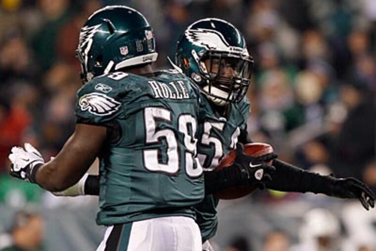 "All of those kids can play. They're not kids - they're young men." Juan Castillo said yesterday of his linebackers. (Yong Kim/Staff Photographer)