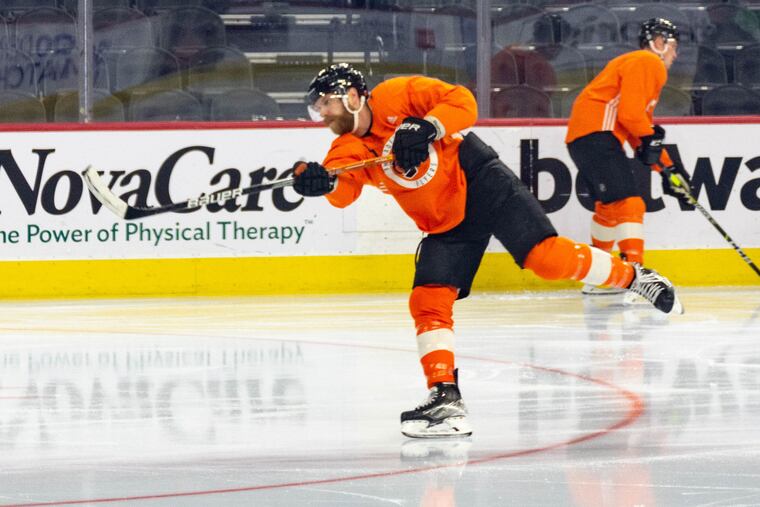 Claude Giroux shoots the puck during an optional morning skate ahead of the Philadelphia Flyers game against the Vegas Golden Knights on Tuesday, Mar. 8, 2022.