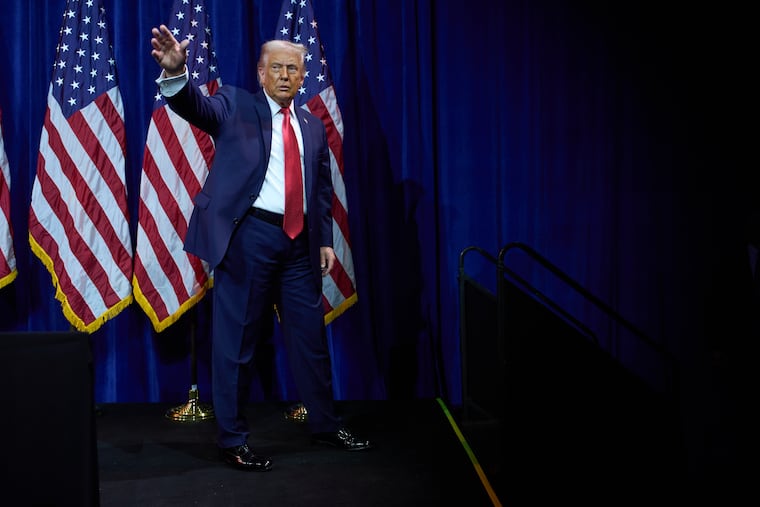 President Donald Trump waves as he walks off stage after speaking to House Republican lawmakers during their annual policy retreat, Tuesday, in Washington.