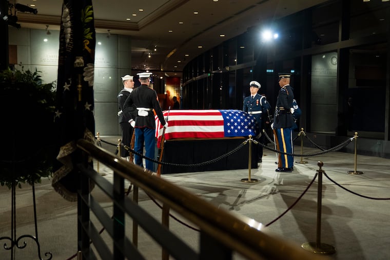 The casket of former President Jimmy Carter as he lies in repose at the Jimmy Carter Presidential Library and Museum in Atlanta on Tuesday.