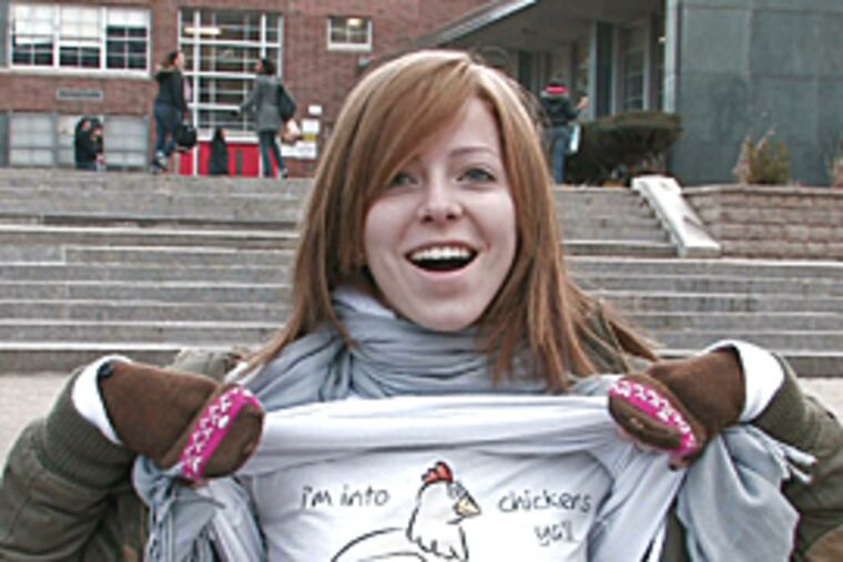Laura Weiszer, a senior at Northeast High School, returns to class today with a new t-shirt that reads "I'm into chickens ya'll" (David
Swanson/Inquirer)