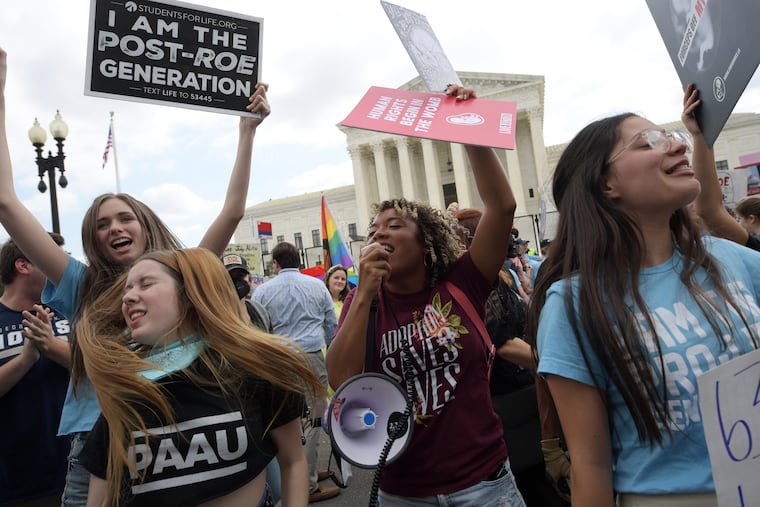 Antiabortion demonstrators celebrating outside the Supreme Court in Washington on June 24 after the court issued a ruling that overturned Roe v. Wade.