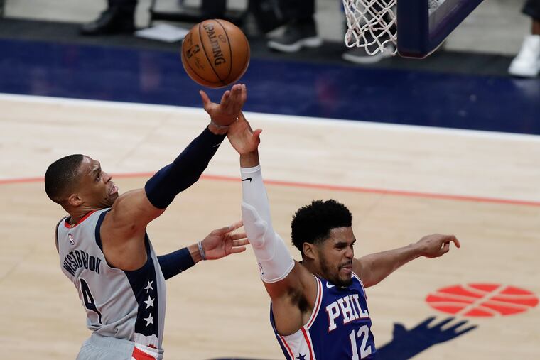 Sixers forward Tobias Harris (right) fouls Wizards guard Russell Westbrook in the third quarter Monday.